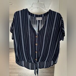 Size small blouse, only worn a few times.